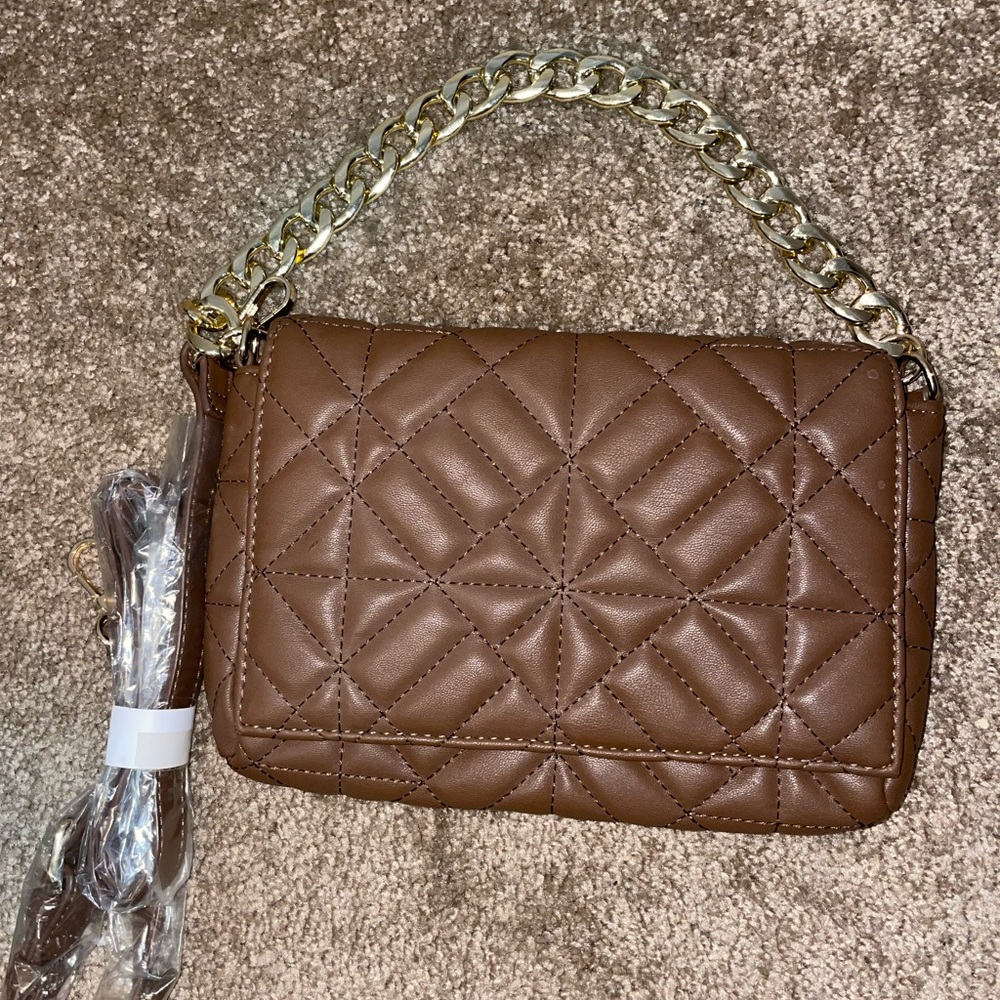 Chocolate quilted handbag with gold chain, can be used as a crossbody also.